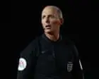 Mike Dean Defends Refereeing Career Amid Podcast Controversy